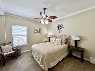 Guest Bedroom 1 has a queen bed and TV