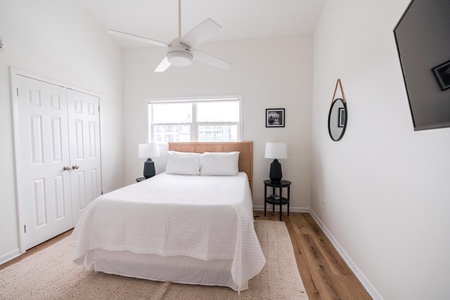 Bedroom #4 is on the 2nd floor of unit B- there is a queen bed, TV and a private bathroom