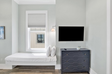 The master bedroom offers a King bed, Twin bed and TV