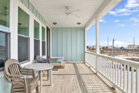 Covered porch with views of the Gulf