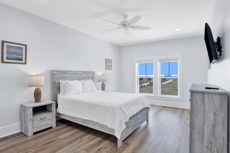 Bedroom 3 on the 2nd floor with a queen bed, Gulf views, ceiling fan, TV and a private bathroom