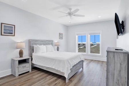 Bedroom 3 on the 2nd floor with a queen bed, Gulf views, ceiling fan, TV and a private bathroom