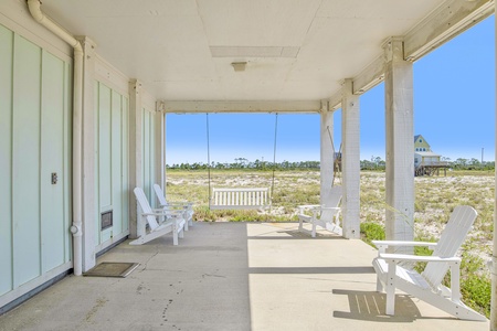 Covered seating area under the home