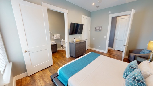 Bedroom 2 features a King bed, TV and private bathroom