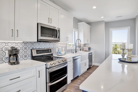 The kitchen is equipped with 2 dishwashers and a double oven