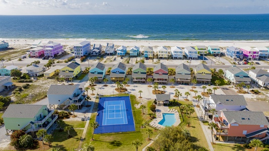 The Pleasure Isle community offers a beach boardwalk, pool, pickle ball, tennis and basketball court!