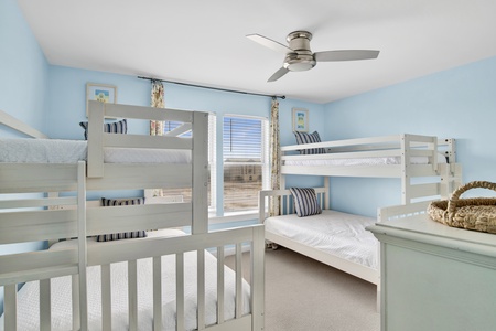 Guest bedroom bedroom 2 has two sets of twin over full bunk beds and a shared bathroom