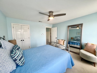 2nd floor guest bedroom with queen bed and TV