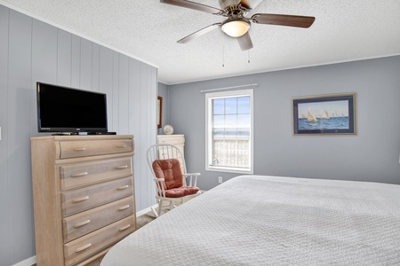 Master bedroom has a TV and private bathroom