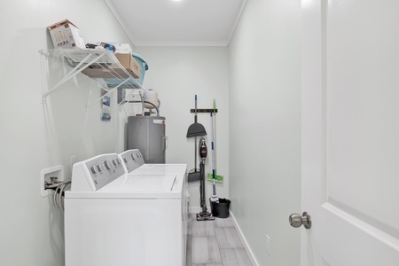 Full size washer and dryer located in the laundry room