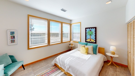 2nd floor bedroom (3) features a TV and queen bed