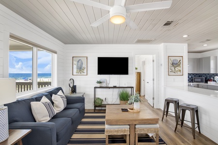 The living room offers a sleeper sofa, sleeping 2 guests