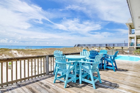 Enjoy morning coffee and afternoon cocktails on the deck