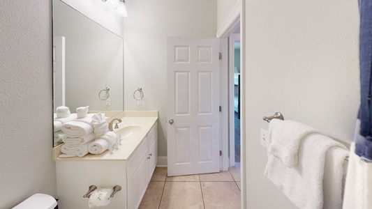 2nd floor shared  hall bathroom with a tub/shower combo