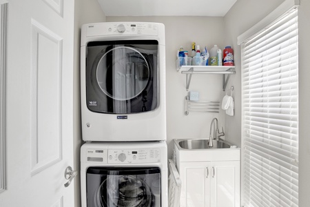1st floor half bath/laundry combo with full size washer/dryer and laundry sink