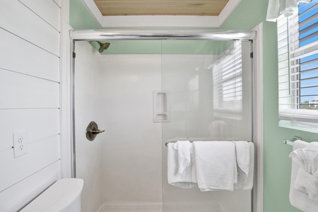 The hall bathroom with a walk-in shower