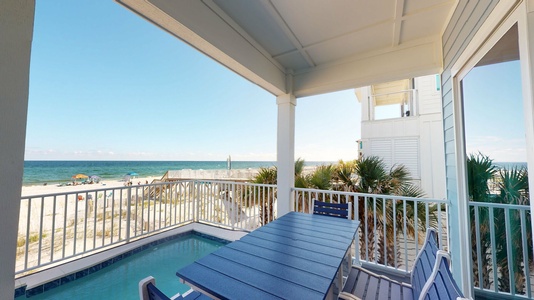 This home has open and covered seating on the pool deck