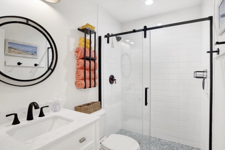 2nd floor bathroom with a tiled walk-in shower