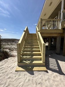 Steps from deck to beach