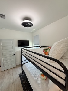 Bedroom 8 offers a TV and Full over Full bunk bed, sleeps 4