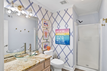 1st floor hall bathroom with a walk-in shower