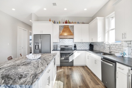 Stainless appliances including a wine cooler