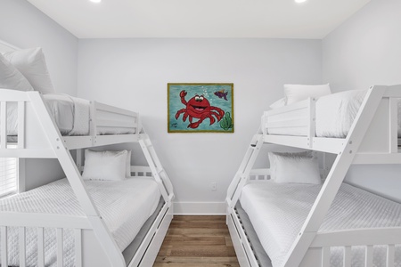 Summertime Blues II-Bedroom 6 (bunk room) sleeps 4 in 2 twin over full bunks and has a TV