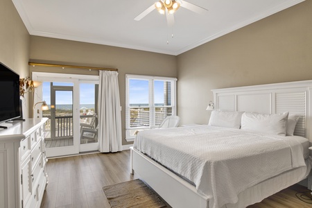 First floor bedroom, with balcony access and private bathroom