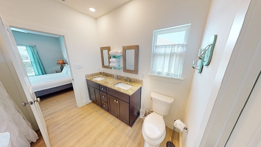 Master bath with double vanity and tub/shower combo