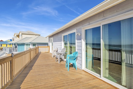 Large deck and a charcoal grill provided