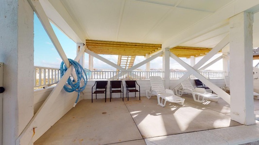 Shaded loungers and seating by the pool