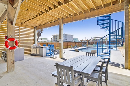 Enjoy meals under the covered, outdoor dining space