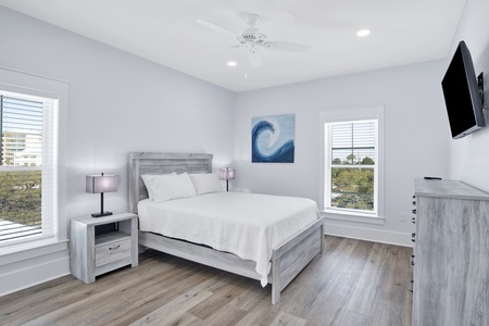 Summertime Blues I-Bedroom 4 on the 2nd floor with a queen bed, ceiling fan, TV and a private bathroom