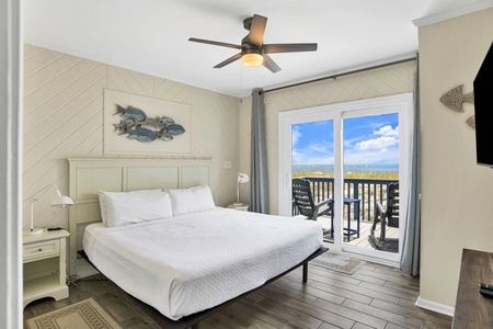 The 1st primary ensuite offers balcony access, TV and King bed, sleeps 2
