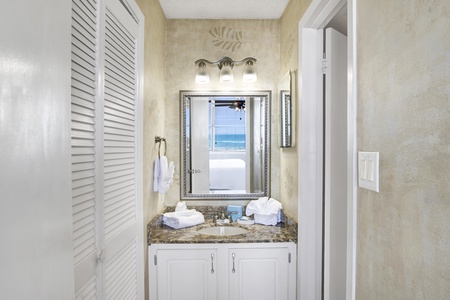 Private master bathroom with a tub/shower combo