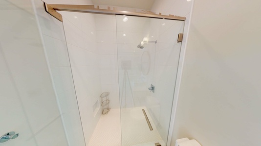 The private bathroom in Bedroom 5 has a walk-in shower