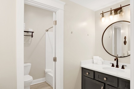 It offers 2 vanities and a tub/shower combo