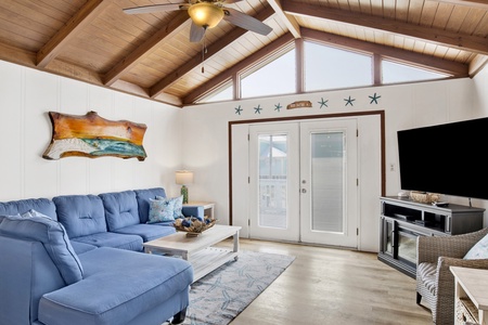 Large living area with vaulted ceiling