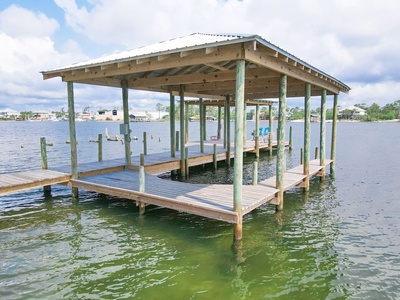 The home has a private covered boat slip