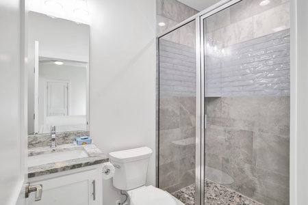 The private bathroom in Bedroom 2 has a walk-in shower