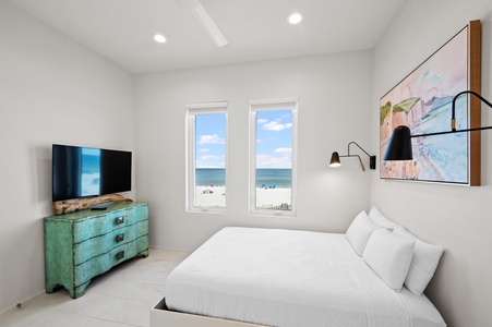 Bedroom 1 has a TV, Gulf views and a private bathroom