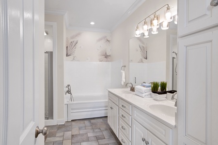 The private bathroom in Bedroom 1 has a double vanity