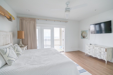 Bedroom #2 has a king bed, TV, private bathroom and balcony access