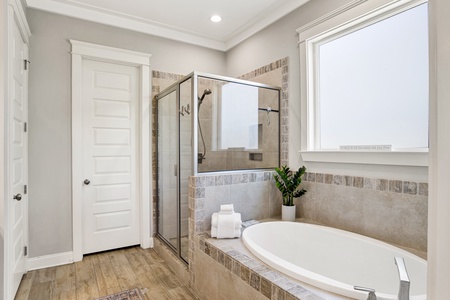 Featuring a soaking tub and walk-in shower