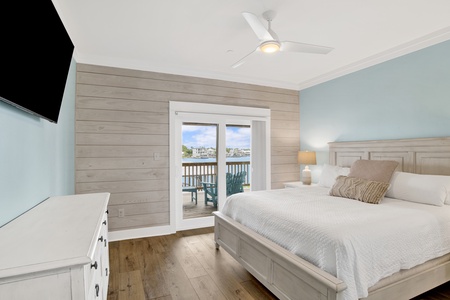 Bedroom 5 offers a private bathroom, balcony access, TV and King bed, sleeps 2