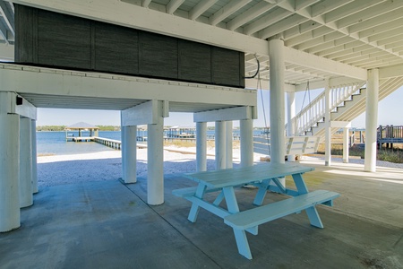 Covered entertaining area under the home