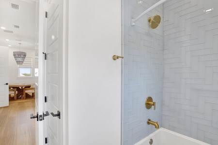 Featuring a tub/shower combo