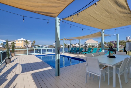 Enjoy meals on the patio at the outdoor dining table