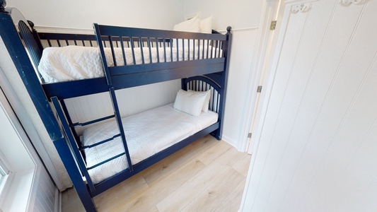 Little-Blue-Bedroom 3 is on the 1st floor and sleeps 2 in a twin bunk bed