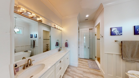 The private Master bath has a double vanity, water closet and a walk-in shower.